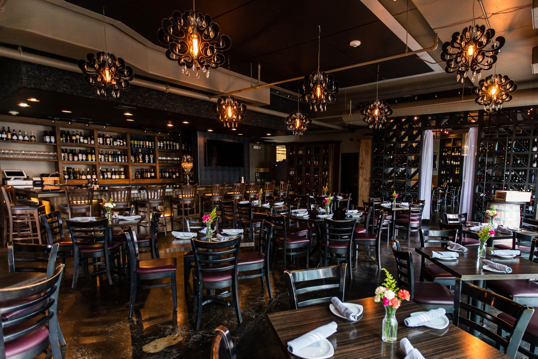 The main dining room and wine wall at D'Vine Wine Bar, Cypress, Texas